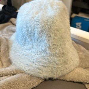 blue furry bucket hat